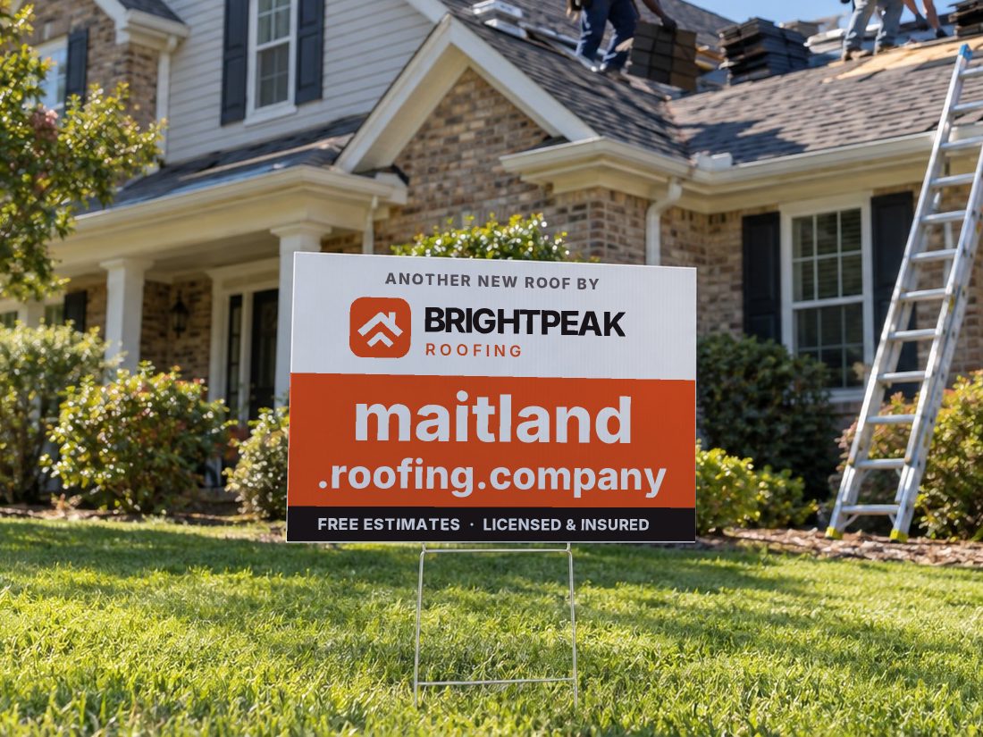maitland.roofing.company on a yard sign in front of a house getting a new roof